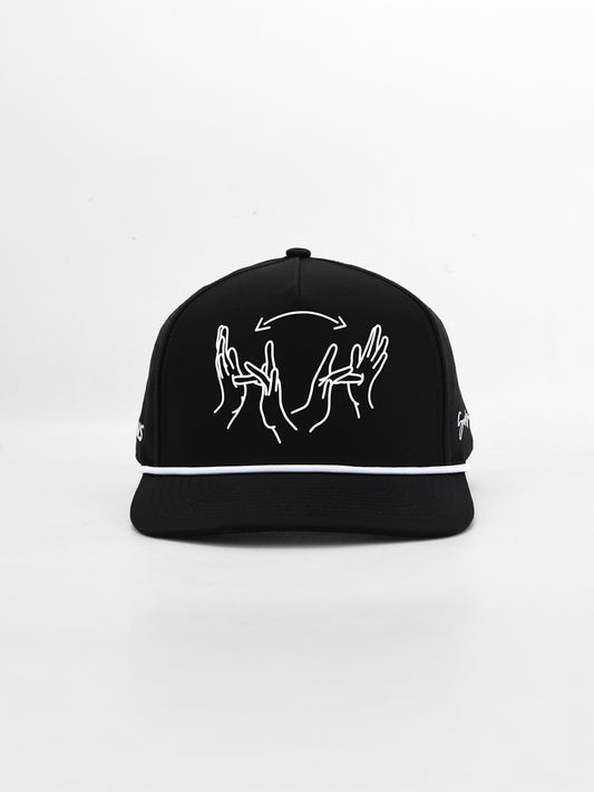 Black cap with white line art design on a white background