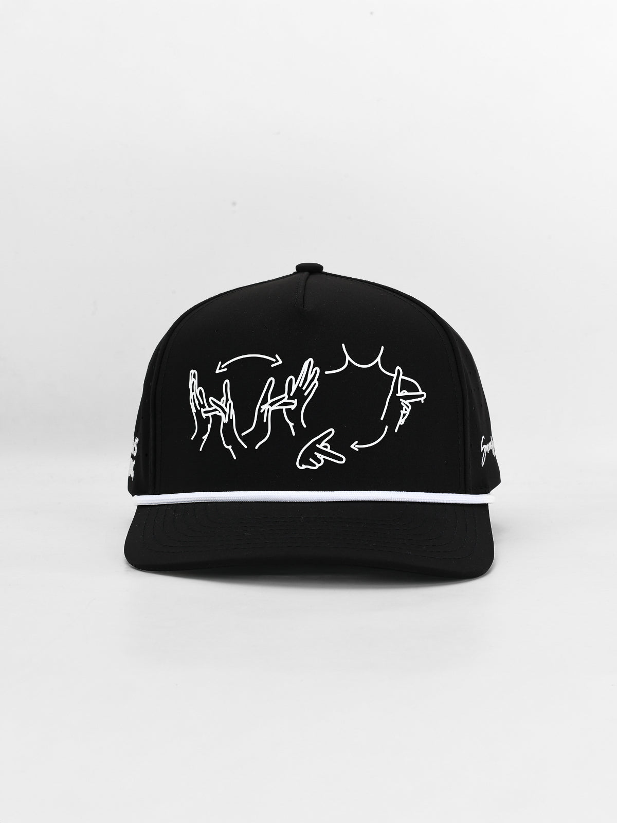 Black cap with white designs on a light gray background