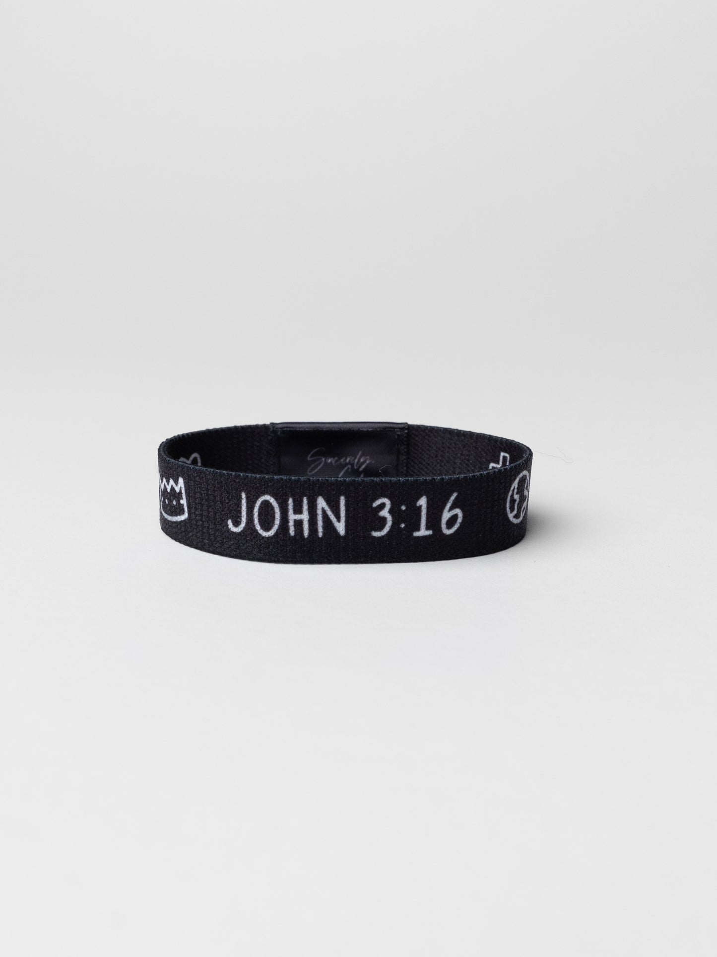 Black wristband with 'JOHN 3:16' text on a white background