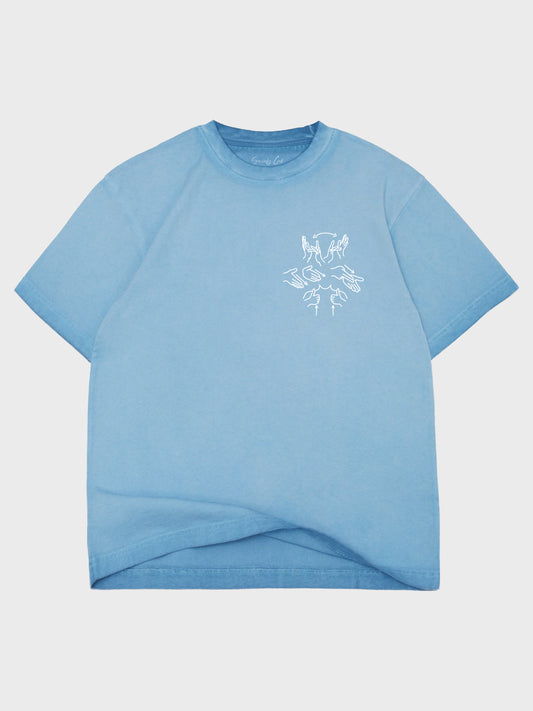 Blue t-shirt with a white graphic on a light gray background