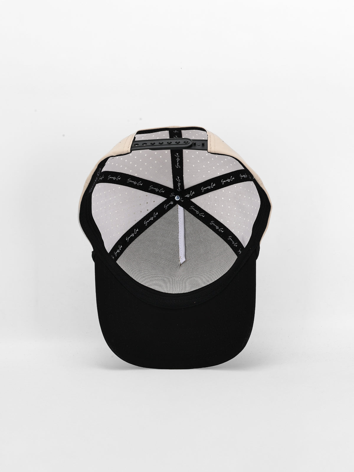 Black and white cap with mesh back on a white background